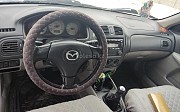Mazda 323, 2003 