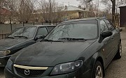 Mazda 323, 2003 