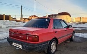 Mazda 323, 1.3 механика, 1993, седан Караганда