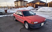 Mazda 323, 1.3 механика, 1993, седан Қарағанды