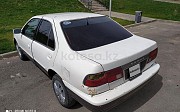 Nissan Sunny, 1.6 механика, 1997, седан Алматы