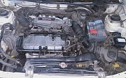 Mazda 323, 1.3 механика, 1992, седан Караганда