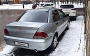 Mitsubishi Lancer, 1.6 механика, 2003, седан 