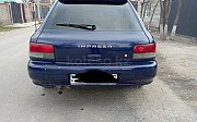 Subaru Impreza, 1.8 автомат, 1997, универсал Алматы