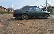 Mazda 323, 1.6 механика, 1991, седан Шымкент