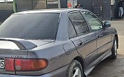 Mitsubishi Lancer, 1.3 механика, 1994, седан Алматы