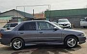 Mitsubishi Lancer, 1.3 механика, 1994, седан Алматы