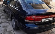 Mazda 626, 2 механика, 1996, лифтбек 