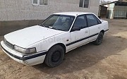 Mazda 626, 2 механика, 1991, седан Жаркент