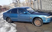 Mazda Cronos, 1.8 механика, 1995, седан Алматы