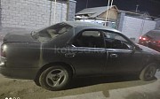 Nissan Bluebird, 2 автомат, 1994, седан Алматы