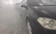 Nissan Primera, 1.8 автомат, 2002, универсал Петропавловск