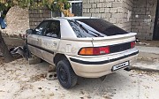 Mazda 323, 1.8 механика, 1993, седан Шымкент