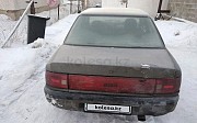 Mazda 323, 1.6 механика, 1992, седан Астана