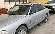 Mazda Cronos, 1.8 механика, 1993, седан Актау