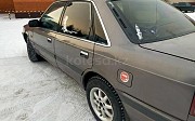 Mazda 626, 2 механика, 1990, седан Петропавловск