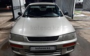 Mazda 323, 1.5 механика, 1994, седан Шымкент