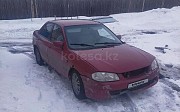 Mazda 323, 1.5 механика, 2000, седан 