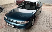 Mazda Cronos, 1.8 механика, 1996, седан Алматы