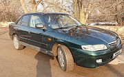 Mazda 626, 2 механика, 2002, седан Алматы