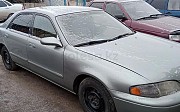 Mazda 323, 2 механика, 1999, седан Семей