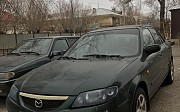 Mazda 323, 1.6 механика, 2003, седан Ақтөбе