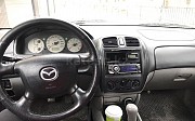 Mazda 323, 1.6 механика, 2003, седан Актобе