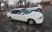 Mazda Familia, 1.5 автомат, 1998, седан Алматы