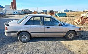 Mazda 323, 1.6 механика, 1992, седан Астана