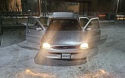 Ford Escort, 1.6 механика, 1997, седан Караганда