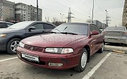 Mazda Cronos, 1.8 механика, 1993, седан Алматы