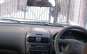 Nissan Sunny, 1.6 автомат, 1998, седан Астана