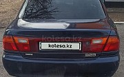 Mazda 323, 1.5 механика, 1996, седан Талдыкорган