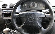 Mazda Familia, 1.3 автомат, 2001, седан Астана