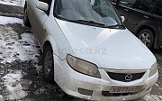 Mazda Familia, 1.3 автомат, 2001, седан Астана
