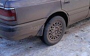 Mazda 626, 2 механика, 1992, седан Мерке