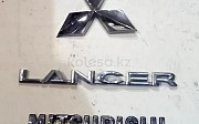 Шильдик Mitsubishi Lancer, 2011-2015 Караганда