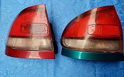 Задний фонарь левый на Мазда Кронос хечбек Mazda Cronos, 1991-1996 Алматы