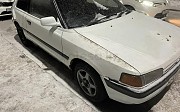 Mazda Familia 1993 г., авто на запчасти Нұр-Сұлтан (Астана)