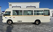 Toyota Coaster 2014 г. 