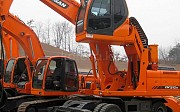 Doosan DX210W MH грейфер перегружатель 2023 г., 