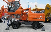 Doosan DX210W MH грейфер перегружатель 2023 г., Тараз