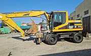 Caterpillar M312 2000 г., экскаватор 